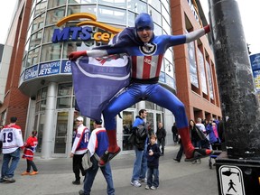 Winnipeg Jets fan Ryan Gilmour celebrates outside the MTS Centre before the team's first game in 2011. Can the Jets blow the roof off the MTSC by making the playoffs in 2013? (REUSTERS)