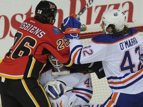 The Oilers and Flames square off Tuesday night in Calgary. (STUART DRYDEN/QMI AGENCY)