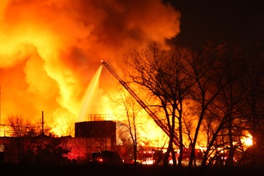 A fire broke out at Gateway Industries in Winnipeg's Point Douglas Wednesday, Oct. 19, 2011. Some area residents  say there were several explosions before the blaze engulfed much  of the facility. (SEBASTIEN PERTH/Winnipeg Sun)