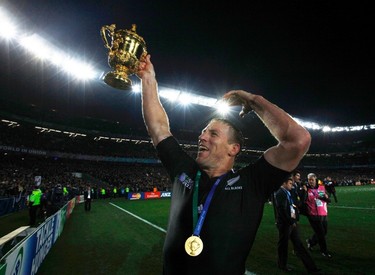 New Zealand's Brad Thorn celebrates with the Webb Ellis Cup after they beat France to win the Rugby World Cup final match at Eden Park in Auckland on Oct. 23, 2011. (REUTERS)