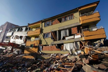 A view shows damaged buildings amid debris after an earthquake in Ercis, near the eastern Turkish city of Van, early October 24, 2011. (REUTERS/Umit Bektas)