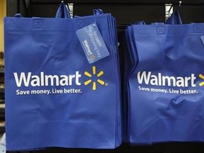 Re-useable Walmart bags are seen in a newly opened Walmart Neighborhood Market in Chicago September 21, 2011. Reuters/Jim Young