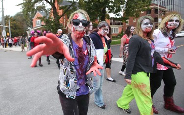 Krista Disher hams it up during the Zombie Walk in St. Catharines on Oct. 22, 2011.  (JULIE JOCSAK/QMI AGENCY)