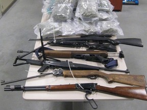 Drugs and weapons seized by Red Deer Mounties. (RCMP Photo)
