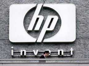 Hewlett Packard hopes to save $3 billion to $3.5 billion annually by laying off about 27,000. (REUTERS/Charles Platiau/Files)