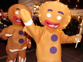 Gingerbread men march in the annual Santa Claus Parade Saturday. (BRIAN DONOGH/WINNIPEG SUN)
