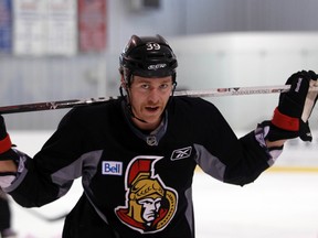 Senators defenceman Matt Carkner sweated it out at practice Tuesday, but with no set return date to the team's lineup. (DARREN BROWN, OTTAWA SUN)