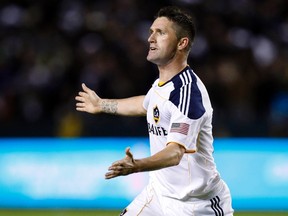 Los Angeles Galaxy forward Robbie Keane celebrates scoring against Real Salt Lake during the second half of their MLS western conference playoff soccer game in Carson, California November 6, 2011. Galaxy won the game 3-1.   (REUTERS/Alex Gallardo)