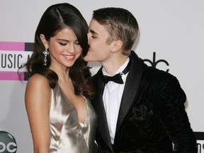 Selena Gomez and Justin Bieber arrive at the 2011 American Music Awards in LA. (WENN)