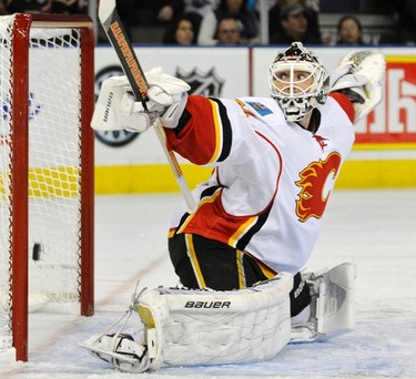 Calgary Flames goalie Miikka Kiprusoff misses a shot from Edmonton Oilers' Sam Gagner (not pictured) during the first period of their NHL hockey game in Edmonton December 3, 2011. (REUTERS/Dan Riedlhuber)