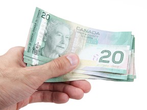 A school board north of Montreal is investigating after a teacher charged two students $30 in cash to help them prepare for an exam. (SHUTTERSTOCK)