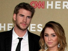 Liam Hemsworth and Miley Cyrus attend the CNN Heroes: An All-Star Tribute at The Shrine Auditorium in Los Angeles on December 11, 2011. (Nikki Nelson/WENN.COM)