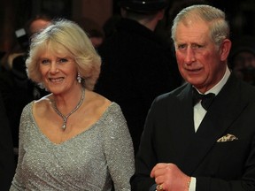 Her Royal Highness, the Princess Charles Philip Arthur George, Princess of Wales and Countess of Chester, Duchess of Cornwall, Duchess of Rothesay, Countess of Carrick, Baroness of Renfrew, Lady of the Isles, Princess of Scotland, Dame Grand Cross of the Royal Victorian Order and the Man Who Would Like To Be King. (REUTERS/Olivia Harris)