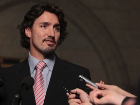 Liberal MP Justin Trudeau speaks to the media after Question Period in the Foyer of the House of Commons at Parliament Hill in Ottawa Nov 21, 2011. (ANDRE FORGET /QMI AGENCY)