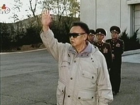 Kim Jong Il, centre, is seen in undated photograph from video video released Wednesday, Nov. 5, 2008, by the North's official Korean Central Television.  (REUTERS)