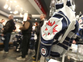 Winnipeg Jets products like those at River City Sports' Kildonan Place are still proving to be popular gifts this Christmas. (JASON HALSTEAD/Winnipeg Sun files)