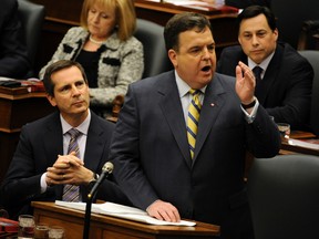 Ontario Finance Minister Dwight Duncan, right, and Premier Dalton McGuinty. (MICHAEL PEAKE/QMI AGENCY)