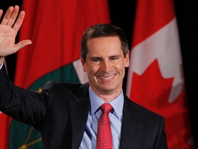 Dalton McGuinty's government will pay out $35.8 million in performance bonuses. (QMI Agency files)