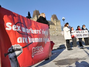 OTTAWA, ON: December 17, 2011 - A group of supporters attend the End Violence Against Sex Workers rally on Parliament Hill on Saturday December 17 2011. 
MATTHEW USHERWOOD/Ottawa Sun/QMI AGENCY