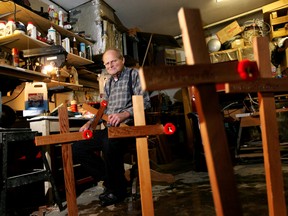 Aart Van Sloten poses for a photo in his Edmonton garage where he makes wooden crosses, one for every Canadian soldier killed in Afghanistan, April 14 , 2011. DAVID BLOOM/EDMONTON SUN  QMI AGENCY