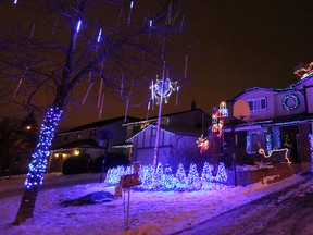 Michael Geiger-Wolf's home at 18 Mildred Street in North Kildonan features a Christmas display with more than 45,000 lights. (JASON HALSTEAD/WINNIPEG SUN)