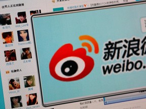 The logo of Sina Corp's Chinese microblog website Weibo is seen on a screen in this photo illustration taken in Beijing Sept. 13, 2011. REUTERS/Stringer