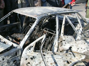 Two booby-trapped cars blew up at security sites in Damascus, killing a number of civilians and soldiers, state television said, in the worst violence to hit Syria's capital during nine months of unrest against President Bashar al-Assad. (REUTERS/Sana)