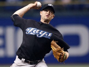 Blue Jays reliever Jason Frasor pitches against the Rays in St. Petersburg, Fla., June 9, 2010. (BRIAN BLANCO/Reuters)