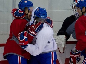 Habs forward Tomas Plekanec (left) and defenceman P.K. Subban tussle during practice in Brossard, Que., on Monday, Jan. 2, 2012. (Ben Pelosse/QMI Agency)