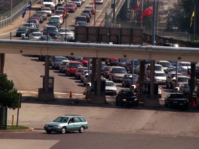 Hundreds of trucks cross the border each day using the Peace Bridge. (QMI Agency Files)