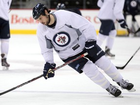 Winnipeg Jets defenceman Zach Bogosian skates during hockey practice at the MTS Centre on Mon., Jan. 2, 2012. (JASON HALSTEAD/Winnipeg Sun)