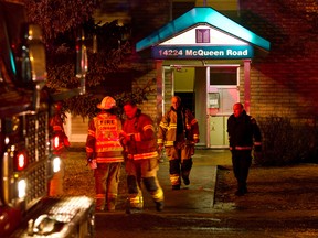 Firefighters respond to a fire at 14224 McQueen Road in Edmonton on Tuesday, January 3, 2012. The cause of the fire was unavailable. CODIE MCLACHLAN/EDMONTON SUN