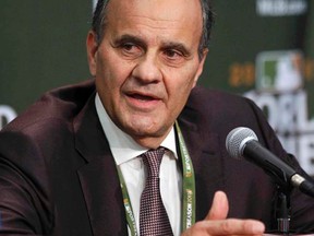 Joe Torre is leaving MLB after a year to become part of a group that plans to bid for ownership of the Dodgers. (REUTERS/Mike Segar/Files)