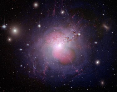 This composite image provided by NASA Wednesday Aug. 20, 2008 shows the active galaxy NGC 1275 (Perseus A). X-ray data from the Chandra's Advanced CCD Imaging Spectrometer and radio data from NRAO's Very Large Array were combined with optical wavelengths in the red, green and blue from Hubble's Advanced Camera for Surveys. (NASA/Handout)