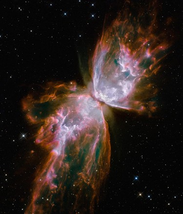 This undated handout image provided by NASA, released Wednesday, Sept. 9, 2009, taken by the refurbished Hubble Space Telescope, shows a celestial object that looks like a delicate butterfly. (NASA/Handout)