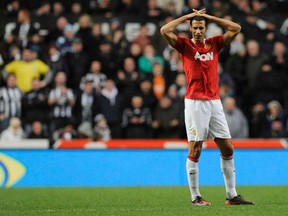 Manchester United's Rio Ferdinand reacts during their English Premier League soccer match against Newcastle United in Newcastle, northern England January 4, 2012. (REUTERS/Nigel Roddis)