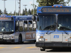Drivers on the Capilano and Southgate routes steer their buses into the South Campus transit centre, in Edmonton, Alberta, on August 23, 2011.  IAN KUCERAK/EDMONTON SUN