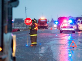 Mounties and emergency crews at a crash along a stretch of Highway 44 — south of Township Road 580. (IAN KUCERAK/EDMONTON SUN FILE PHOTO)