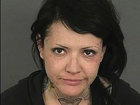 Carmen Tisch, who is charged with criminal mischief, is seen in this Denver County Jail booking photograph released to Reuters on January 4, 2012.
