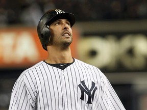 New York Yankees' Jorge Posada reacts after grounding out in the eighth inning in what could be his last at bat as a Yankee in Game 5 against the Detroit Tigers in their MLB American League Division Series baseball playoffs at Yankee Stadium in New York, October 6, 2011.  (REUTERS/Mike Segar)