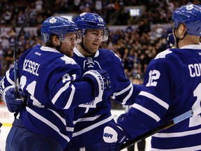 Joffrey Lupul (centre), Phil Kessel and Tim Connolly have helped get the Leafs 47 points in the first half of the season. (Dave Abel/Toronto Sun)