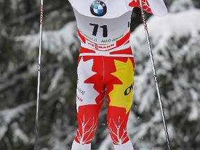 Devon Kershaw of Canada competes in the men's FIS World Cup cross-country skiing 5km classic individual race in Dobbiaco on January 3, 2012. (REUTERS/Alessandro Garofalo)