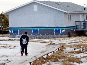 A youth walks in the Samson Cree First Nation Townsite in Hobbema. The Samson Cree First Nation just passed a bylaw allowing residents to ban gang members. AMBER BRACKEN/EDMONTON SUN