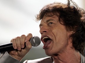 Mick Jagger of the Rolling Stones performs during the Rolling Stones' "A Bigger Bang" free concert on Copacabana Beach in Rio de Janeiro February 18, 2006. (REUTERS/Sergio Moraes)