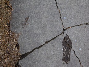 A crack in an Edmonton sidewalk. (File)