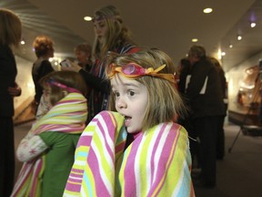 Claire and twin sister Grace, 5, showed up with other children and concerned parents at City Hall on Monday in an effort to save five city-owned pools. (STAN BEHAL/Toronto Sun)