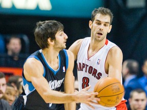 Raptors point guard Jose Calderon tries to steal the ball from Timberwolves guard Ricky Rubio during Monday's game at the ACC. (ERNEST DOROSZUK/Toronto Sun)