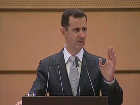 Syria's President Bashar al-Assad speaks at Damascus University on Jan.10 in this still image taken from video. (REUTERS/Syrian TV via Reuters TV)