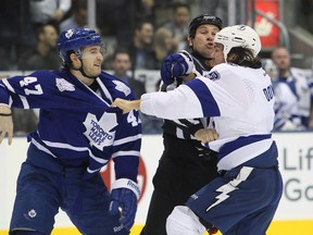 Leafs forward Darryl Boyce (left) gets into it with Bolts winger Steve Downie at the ACC on Tuesday night. Boyce had an even-strength goal and was crucial on the PK. (US Presswire)