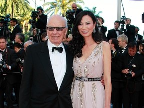 News Corp CEO Rupert Murdoch and his wife Wendi Deng. REUTERS/Eric Gaillard